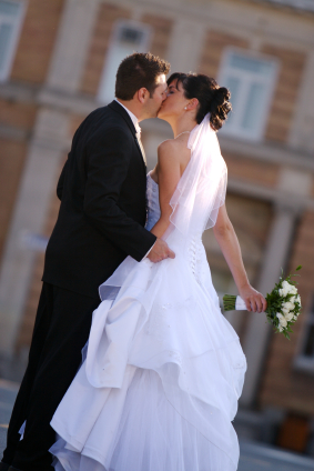 Picture of Bride and Groom Kissing on their Wedding Day