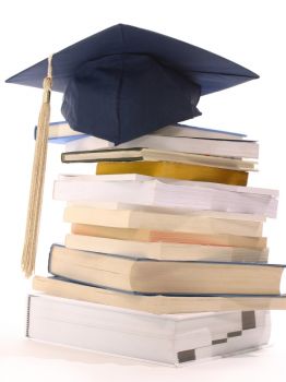 The celebrations of graduation follow long years of study Books and Graduation Cap