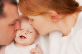 Picture of a newborn baby with parents