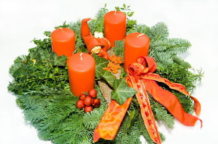 Wreath with four pillar candles